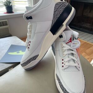 Jordan White and Black Sneakers with Red Accents